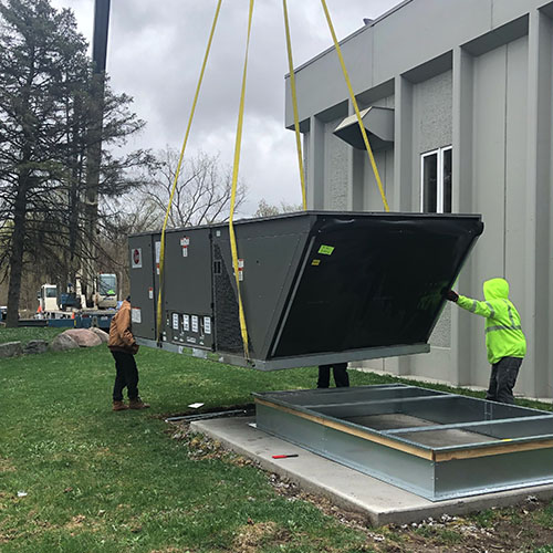 Commercial HVAC unit being installed