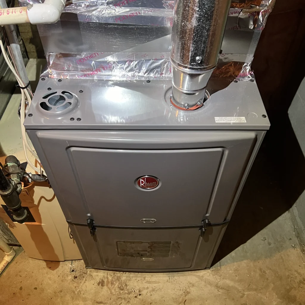 Fall furnace inspection on a Rheem furnace in Oakland County Michigan.